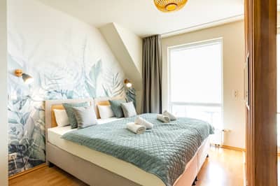2. Schlafbereich mit hochwertigen Boxspringbetten
